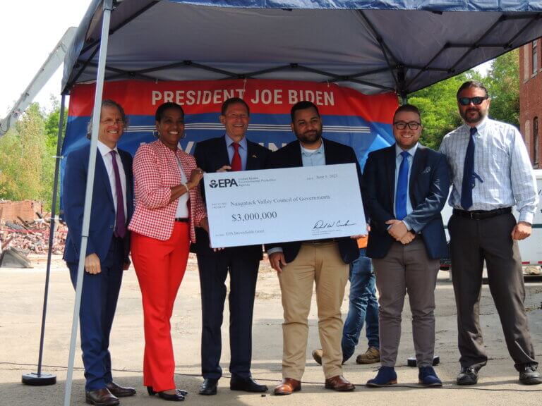 Left to right: David Cash, Jahana Hayes, Richard Blumenthal, Ricardo Rodriguez, Steven Perry, and Aaron Budris proudly holding a check for $3 million made out to NVCOG.